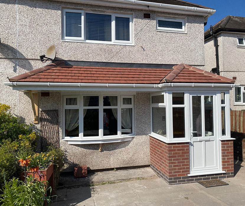Hipped Porch window combination with modern white upvc door